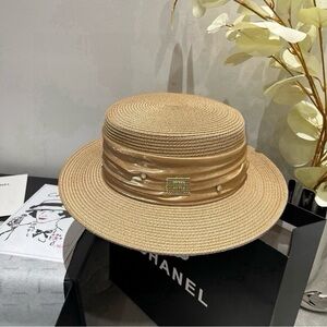 CHANEL Tan Hat with Gold Accents